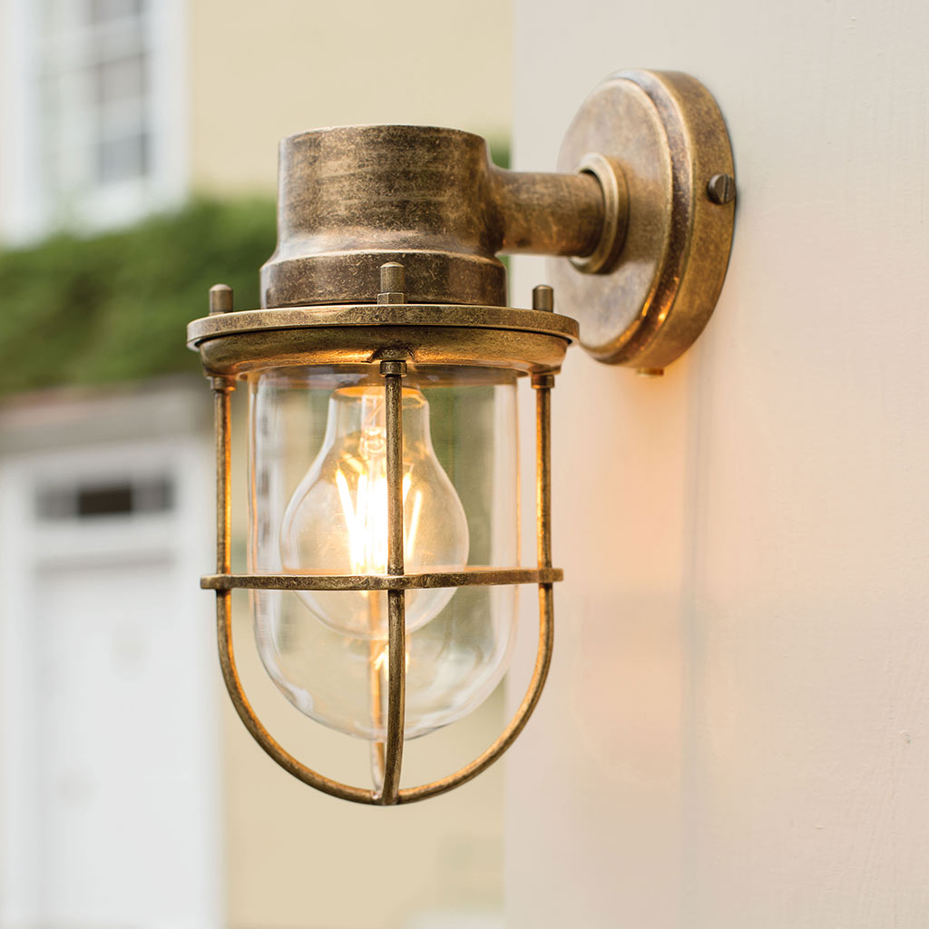 JIM LAWRENCE WALL MOUNTED SHIP’S LIGHT IN ANTIQUED BRASS